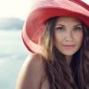 Beautiful,Girl,In,A,Red,Hat,Smiling,At,The,Summer