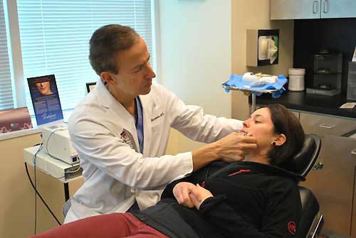 examining patient