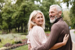 Beautiful mature couple taking a springtime walk